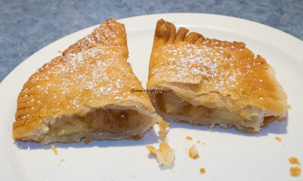 Fried apple pie. View of the delicious filling.