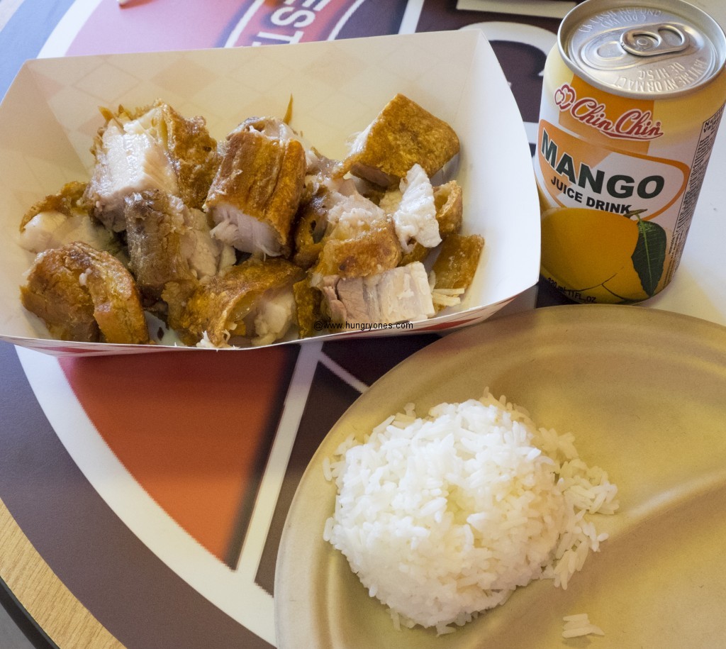 Lechon kawali, jasmine rice, and mango drink.