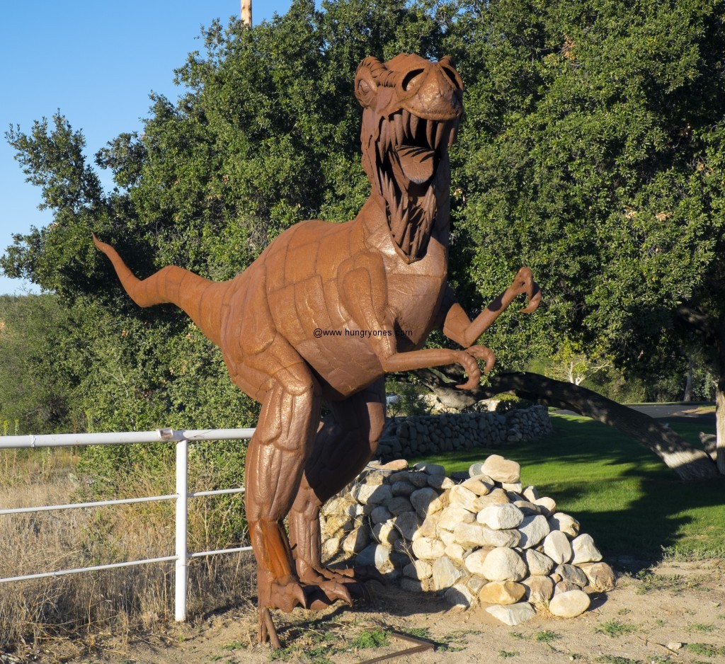 Metal dinosaur guarding the entrance to Vail Lake Resort.
