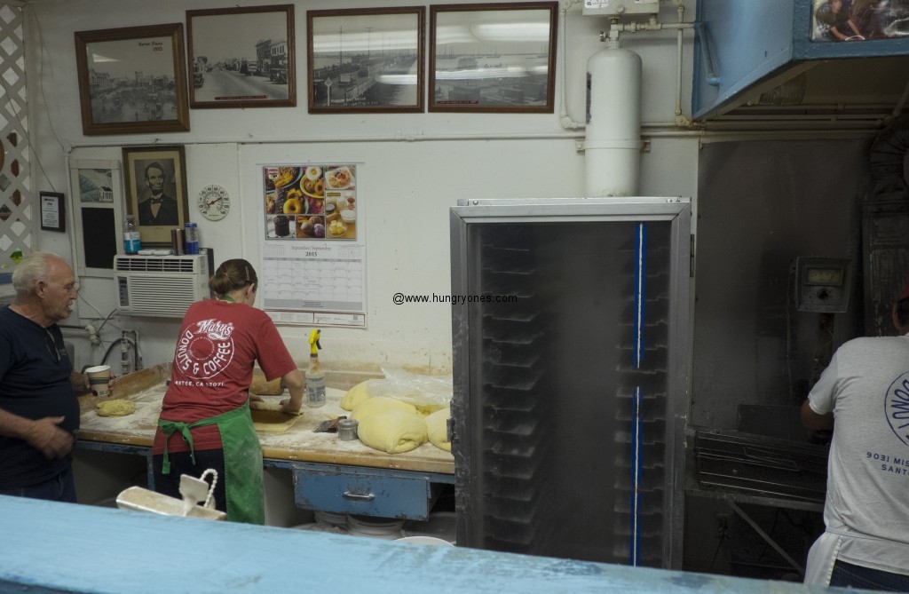 Donut maker at work.