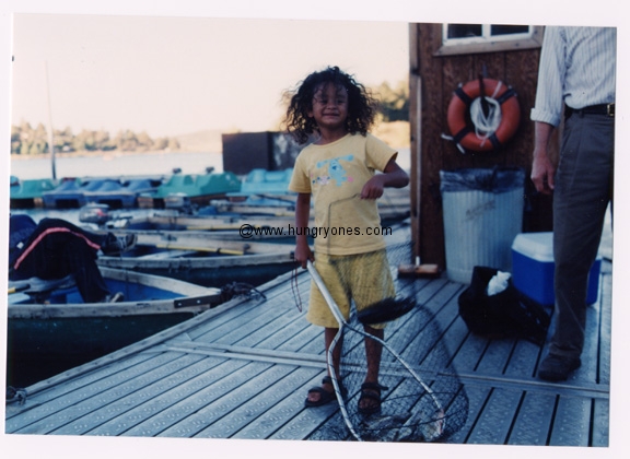 Mari shows off the fish she caught with Phel Steinmetz.