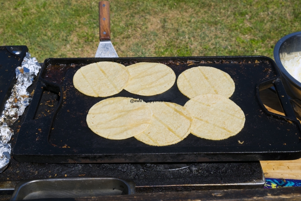 Warming up the tortillas.